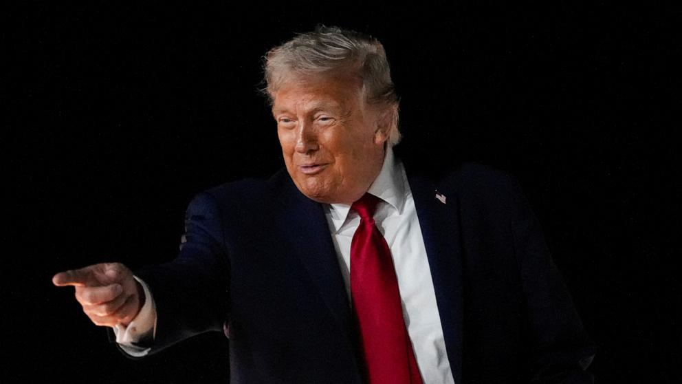 PHOTO: President Donald Trump reacts as he boards Air Force One, after attending Game 3 of the NBA Finals, at John F. Kennedy International Airport in New York, on June 8, 2026.