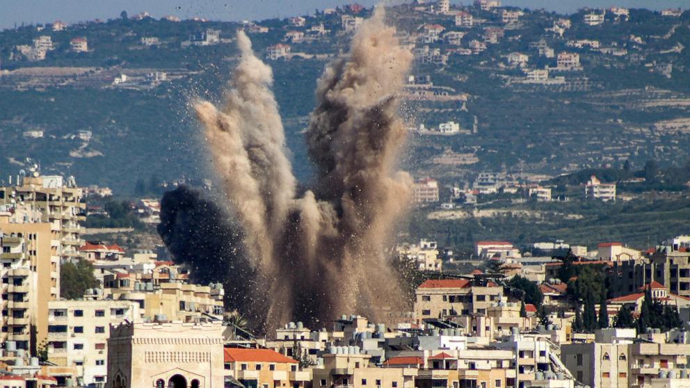 PHOTO: An explosion erupts in the area of al-Housh following Israeli bombardment as seen from Tyre in southern Lebanon on May 12, 2026.