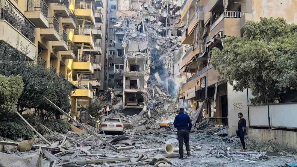 PHOTO: People look at damage from an Israeli strike in Tyre, southern Lebanon, on May 28, 2026.