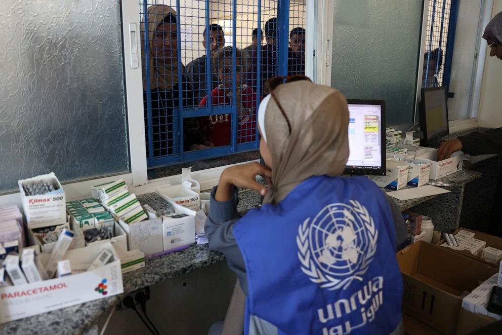 PHOTO: Palestinians queue to receive medicine at the UNRWA Japanese Health Center in Khan Younis in the southern Gaza Strip on Oct. 29, 2024.