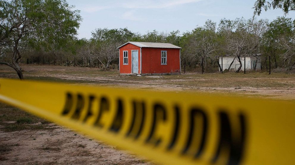 PHOTO: A general view of a storage shed behind a police cordon, at the scene where authorities found the bodies of two of four Americans kidnapped by gunmen, March 7, 2023, in Matamoros, Mexico.