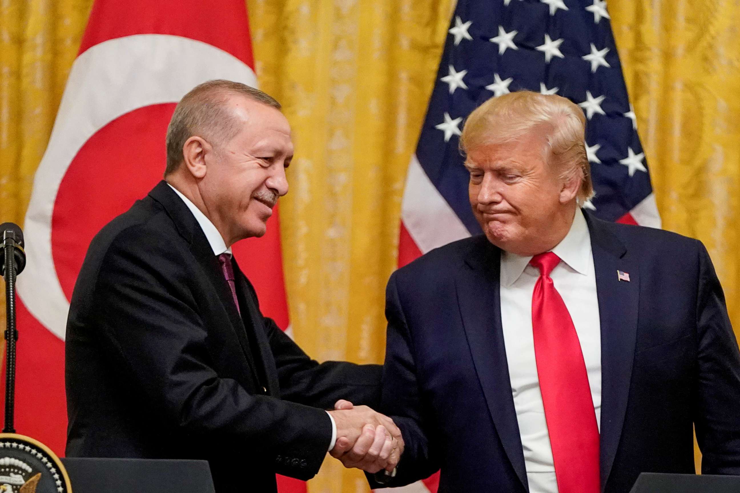 FILE PHOTO: U.S. President Donald Trump greets Turkey's President Tayyip Erdogan during a joint news conference at the White House in Washington, U.S., November 13, 2019. REUTERS/Joshua Roberts/File Photo