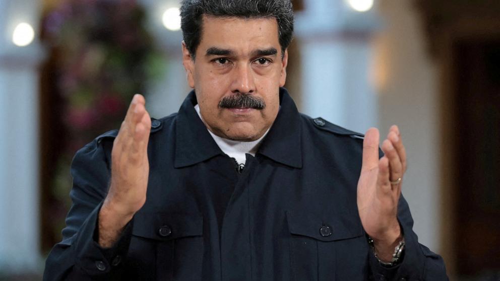PHOTO: FILE PHOTO: Venezuela's President Nicolas Maduro speaks during a broadcast at Miraflores Palace in Caracas