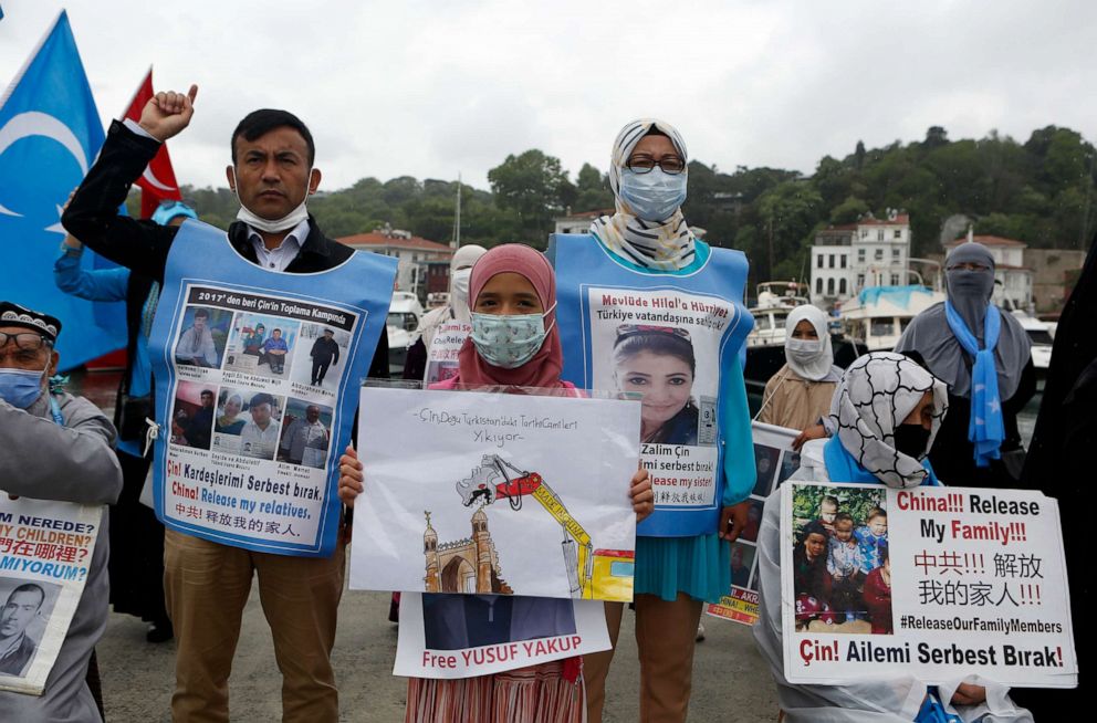 PHOTO: Members of Uyghur community living in Turkey stage a protest outside the Chinese consulate in Istanbul, Wednesday, June 2, 2021. They protest agains alleged oppression by the Chinese government to Muslim Uyghurs in far-western Xinjiang province.