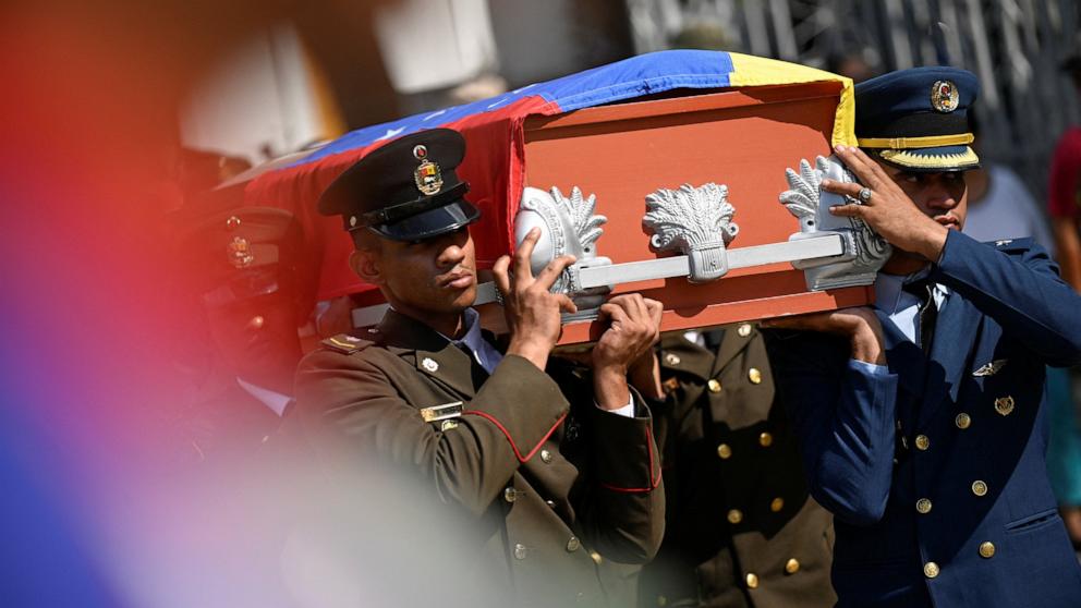 PHOTO: Military personnel carry a casket during the funeral of soldiers killed in the U.S. operation in Venezuela in Caracas on Jan. 7, 2026.