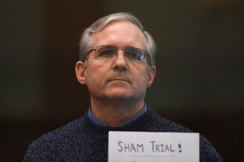 PHOTO: Paul Whelan, a former US marine accused of espionage and arrested in Russia in December 2018, stands inside a defendants' cage as he waits to hear his verdict in Moscow on June 15, 2020.