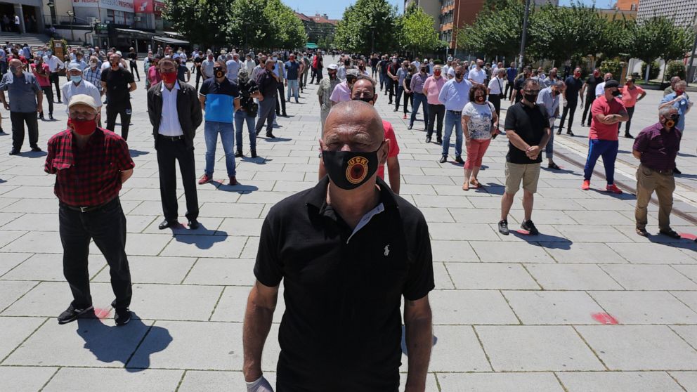 War veterans of the Kosovo Liberation Army (KLA) attend a protest in Pristina, Kosovo, Thursday, July 9, 2020. War veterans of the Kosovo Liberation army, or KLA, that fought for independence from Serbia held a protest against the indictment of the c