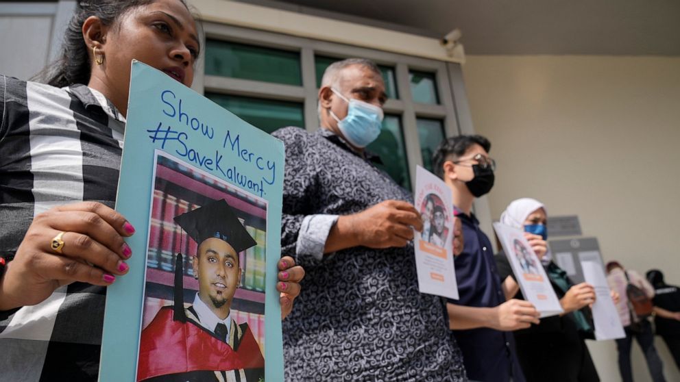 Anti-death penalty activists protest the upcoming execution of a Malaysian convicted for drug trafficking after they handed in a memorandum to the Singapore High Commission, in Kuala Lumpur, Malaysia on July 4, 2022. Two drug traffickers were hanged 