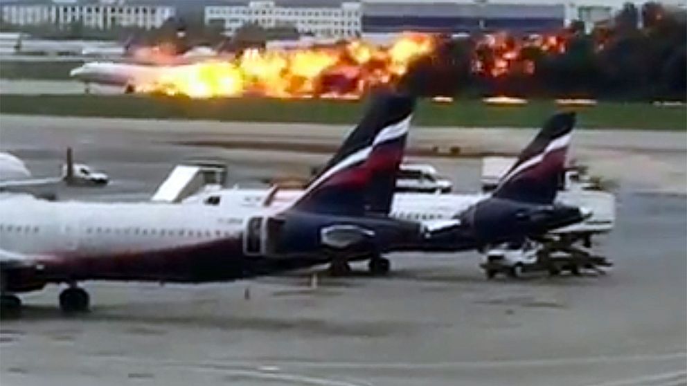 This image taken from video provided by Instagram user @artempetrovich, shows the SSJ-100 aircraft of Aeroflot Airlines on fire during an emergency landing in Sheremetyevo airport in Moscow, Russia, Sunday, May 5, 2019. (@artempetrovich via AP)