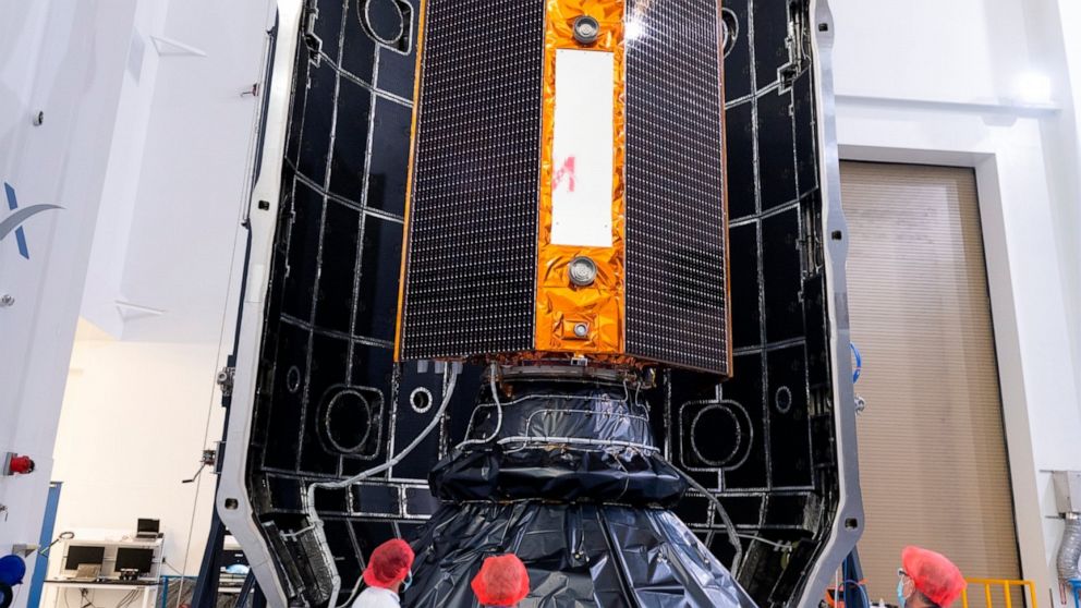 In this Nov. 3, 2020 photo, provide by the European Space Agency, the Sentinel-6 satellite is placed inside the upper stage of a Falcon 9 rocket. The joint European-U.S. satellite mission to improve measurements of sea level rise is being launched fr
