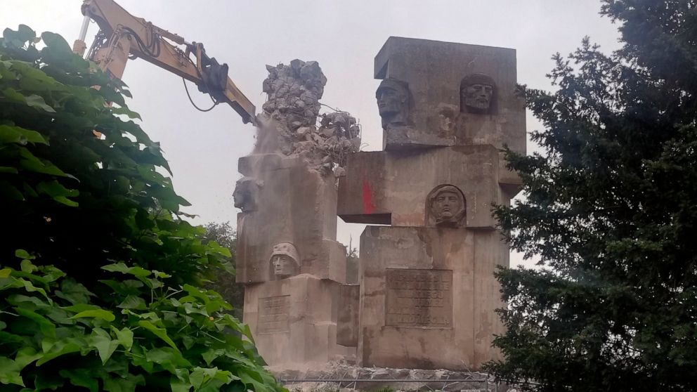 Workers begin to demolish a Soviet-era monument to the Red Army, in Brzeg, Poland, on Wednesday Aug. 24, 2022. Poland on Wednesday began demolishing a memorial to the Soviet Red Army soldiers, an unwanted reminder of the power Moscow once held over P