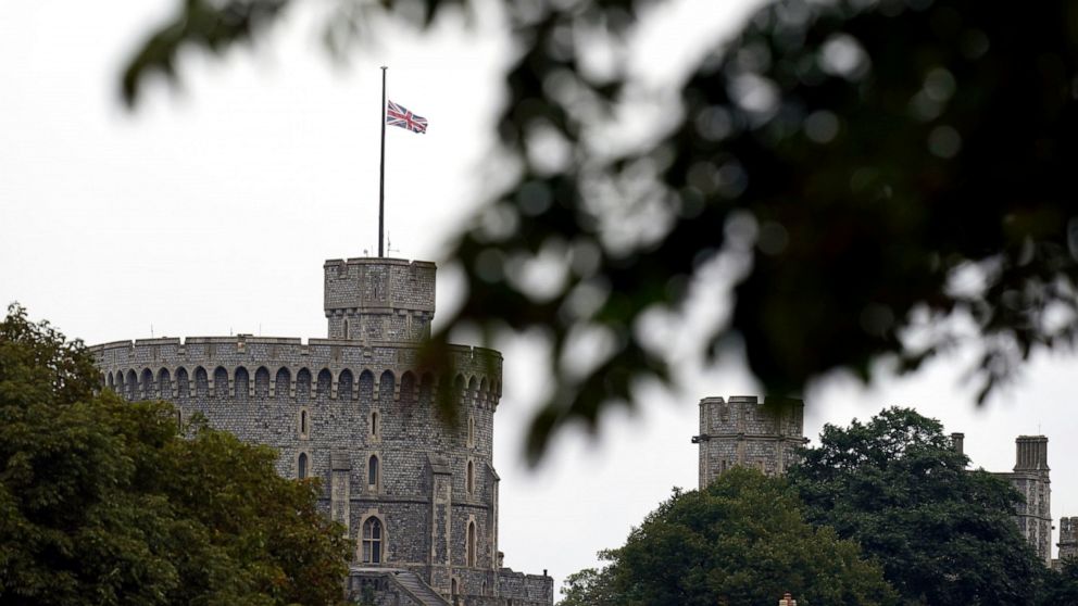 The British flag flies at half mast at Windsor Castle, Berkshire, following Thursday's death of Queen Elizabeth II, Friday Sept. 9, 2022. Queen Elizabeth II, Britain's longest-reigning monarch and a rock of stability across much of a turbulent centur