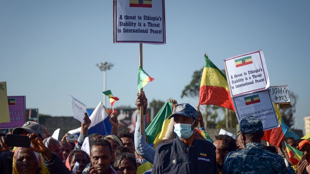 FILE - Ethiopians protest against what they say is interference by outsiders in the country's internal affairs and against the Tigray People's Liberation Front (TPLF), the party of Tigray's fugitive leaders, at a rally organized by the city administr