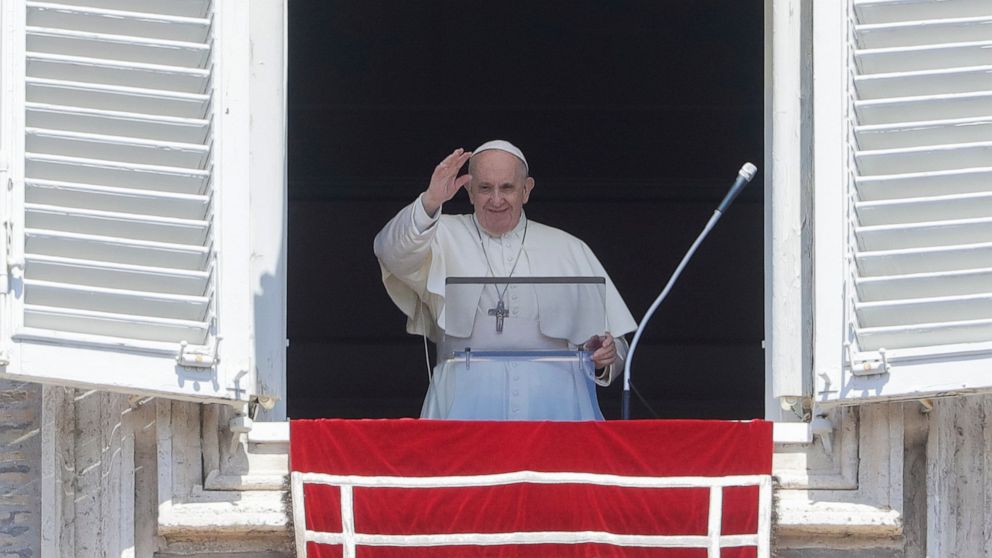 Pope Francis delivers his blessing as he recites the Regina Coeli noon prayer from the window of his studio overlooking St.Peter's Square, at the Vatican, Sunday, April 25, 2021. (AP Photo/Andrew Medichini)