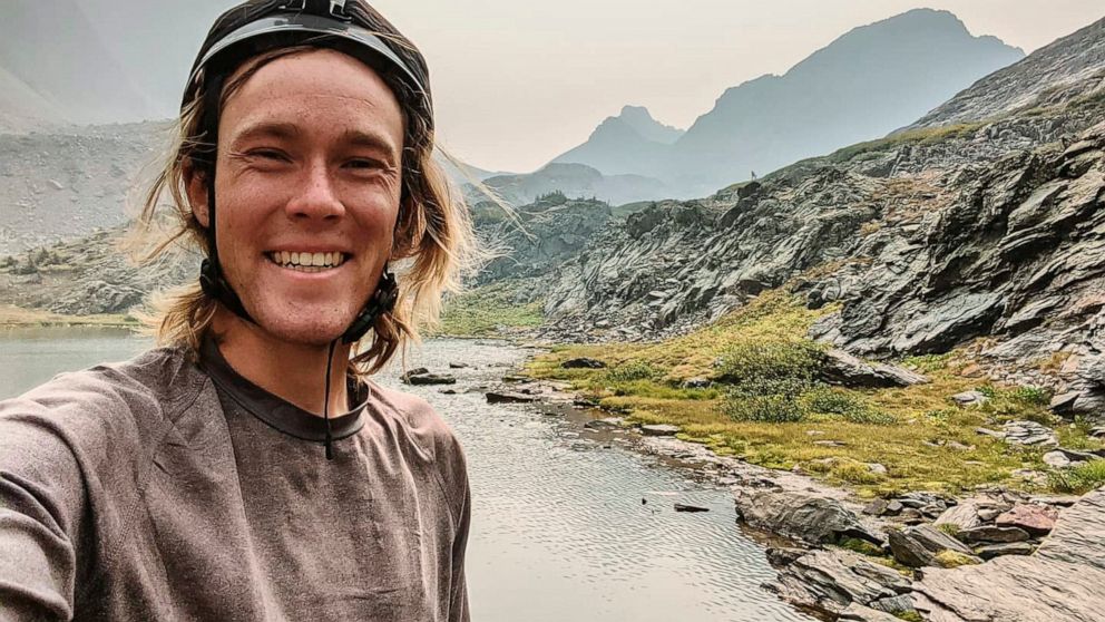 In this Sept. 12, 2020, photo provided by Jean Granberg, her son, Daniel Granberg poses for a selfie at the basin just south of Trinity and Storm King Peaks in Silverton, Colo. The body of the American man, who died while climbing one of Bolivia’s hi