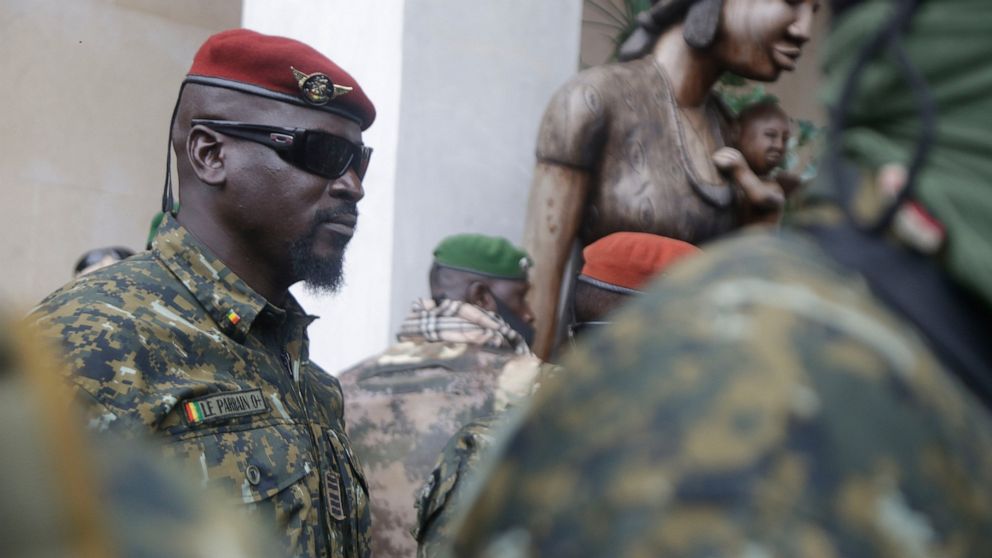 FILE - Guinea's Junta President Col. Mamady Doumbouya, leaves a meeting with an ECOWAS delegation in Conakry, Guinea, Sept. 10, 2021. West Africa is grappling with a wave of military coups over the past 18 months that has some wondering which country