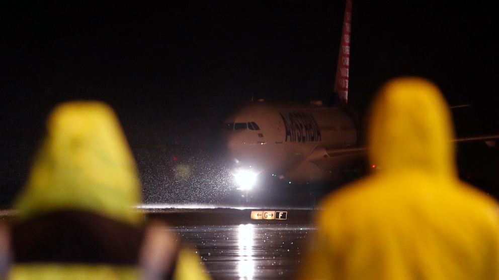 FILE - An Air Serbia passenger plane rolls on the tarmac after a flight at Belgrade's Nikola Tesla Airport, Serbia, Feb. 10, 2021. AirSerbia will go back to one flight a day for Moscow, the Serbian president said, following criticism that the country