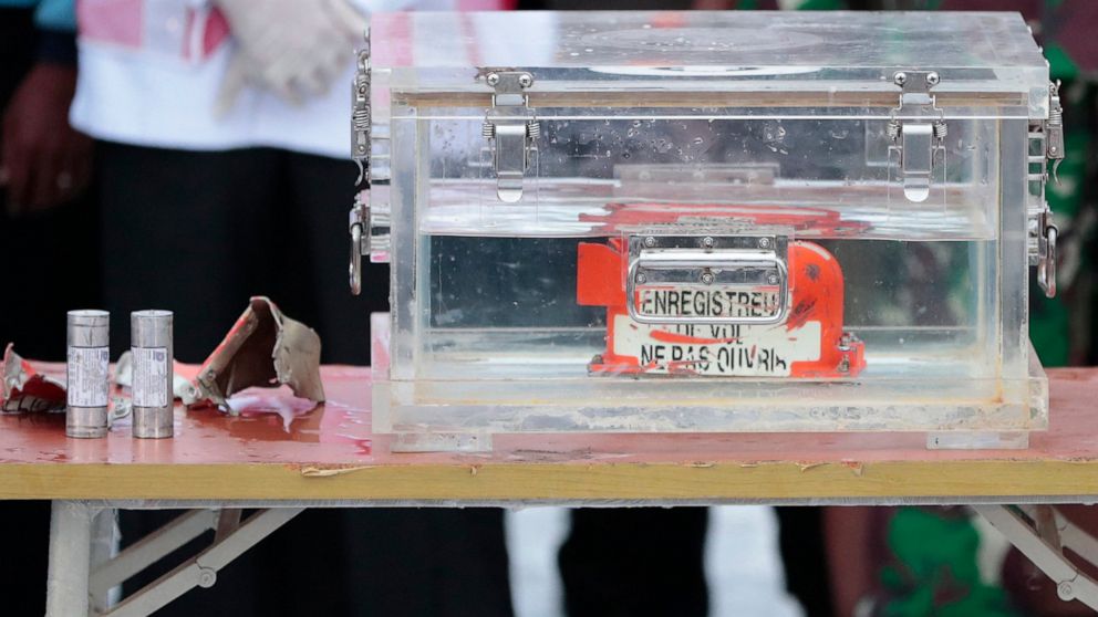 A box containing the flight data recorder recovered from the crash site of the Sriwijaya Air flight SJ-182 in the Java Sea sits on display at Tanjung Priok Port, Tuesday, Jan. 12, 2021. Indonesian navy divers searching the ocean floor on Tuesday reco