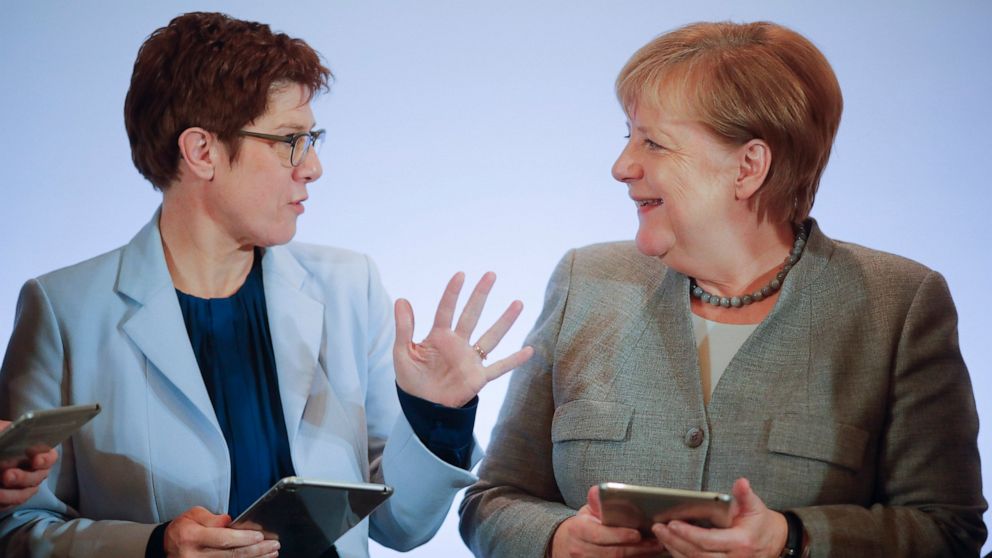 Merkel’s heir apparent takes on critics, wins applause - ABC News