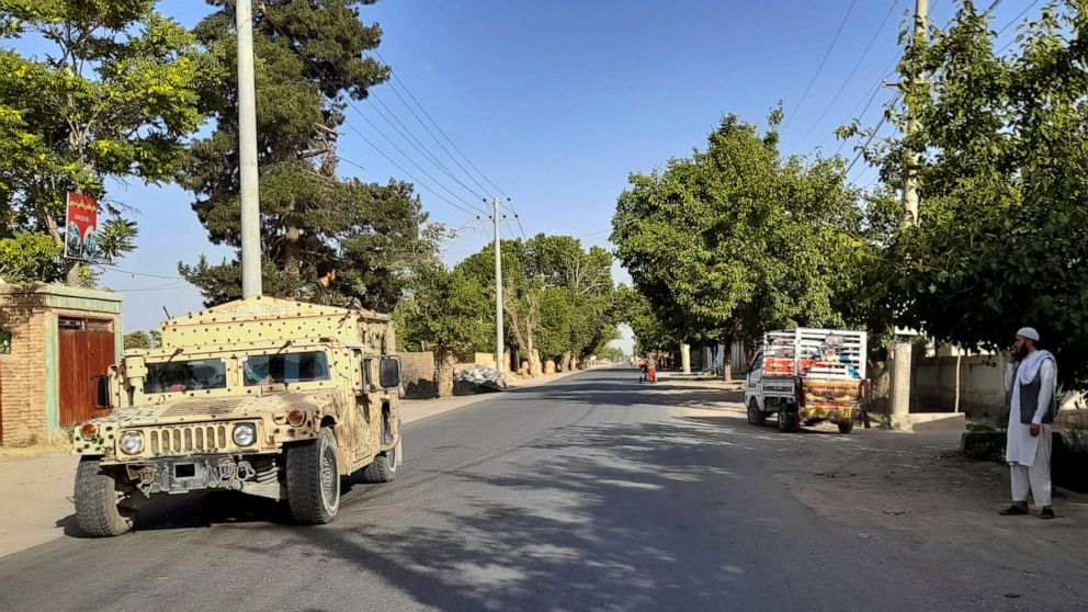An Afghan army Humvee patrols in Kunduz city, north of Kabul, Afghanistan, Monday, June 21, 2021. Taliban fighters took control of a key district in Afghanistan's northern Kunduz province Monday and encircled Kunduz, the provincial capital, police sa