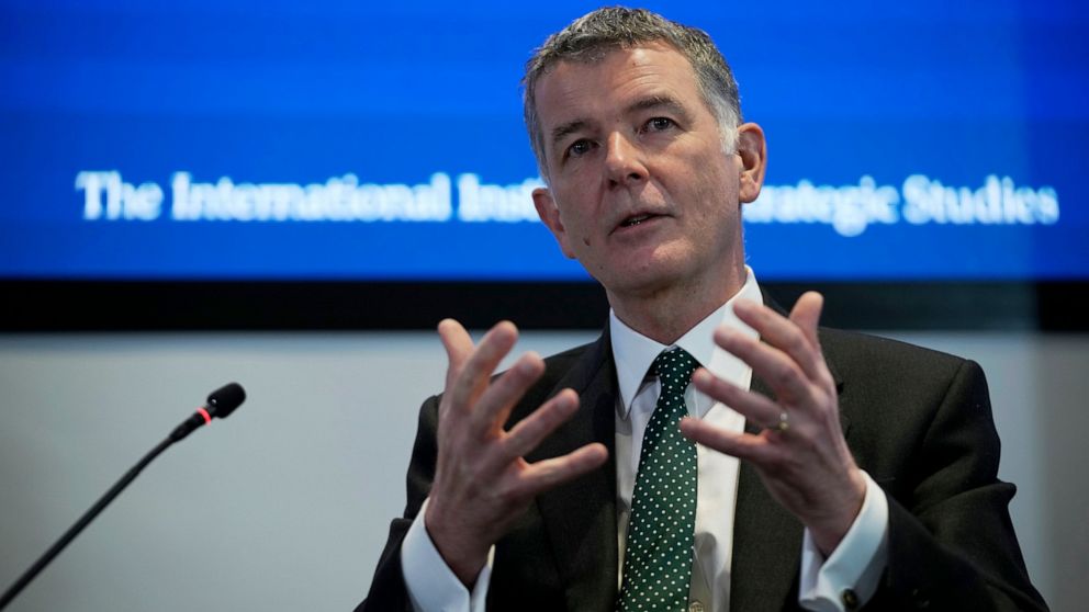 Richard Moore, the Chief of Britain's Secret Intelligence Service, also known as MI6, answers questions after giving his first public speech since becoming head of the organisation, at the International Institute for Strategic Studies, in London, Tue