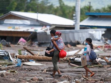 Nearly 100 dead, dozens missing in storm-ravaged Philippines