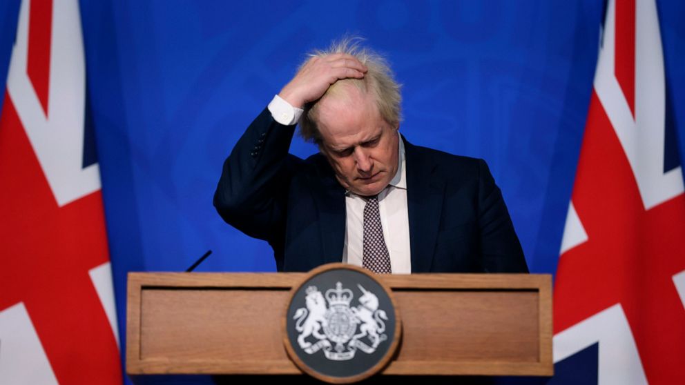 UK's Johnson faces political threat in virus rules votes