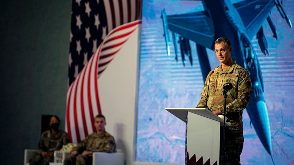 This image provided by the U.S. Air Force shows U.S. Air Force Lt. Gen. Alexus G. Grynkewich, incoming Ninth Air Force (Air Forces Central) commander, delivering a commemorative speech during a change of command ceremony at al-Udeid Air Base, Qatar, 