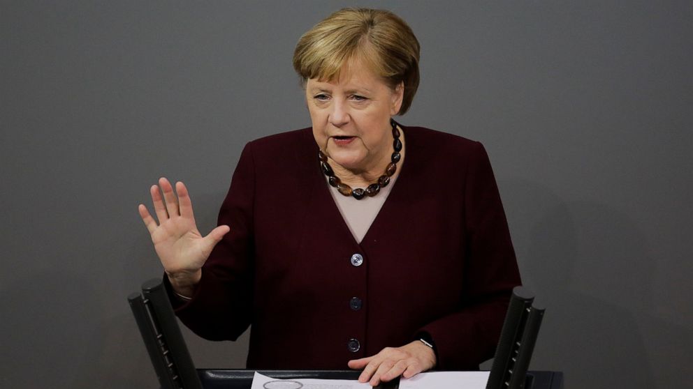 German Chancellor Angela Merkel delivers a speech about German government's policies to combat the spread of the coronavirus and COVID-19 disease at the parliament Bundestag, in Berlin, Germany, Thursday, Nov. 26, 2020. Merkel and the country's 16 st