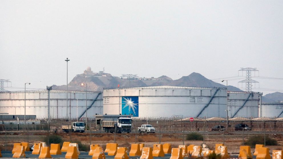 FILE - This Sept. 15, 2019 file photo, shows storage tanks at the North Jiddah bulk plant, an Aramco oil facility, in Jiddah, Saudi Arabia. Saudi Arabia's state-owned oil company Aramco on Thursday, Dec. 5, 2019, set a share price for its IPO — expec