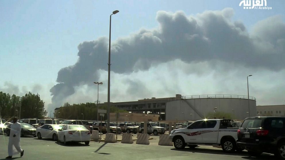 FILE - In this Saturday, Sept. 14, 2019 file photo, made from a video broadcast on the Saudi-owned Al-Arabiya satellite news channel, smoke from a fire at the Abqaiq oil processing facility fills the skyline, in Buqyaq, Saudi Arabia. The weekend dron
