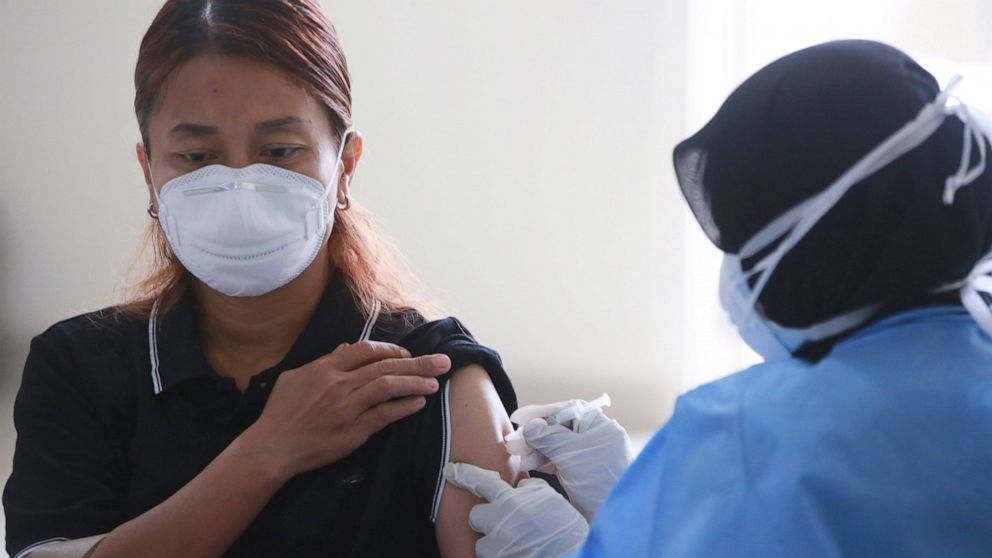 Indonesia surpasses 100,000 deaths amid new virus wave