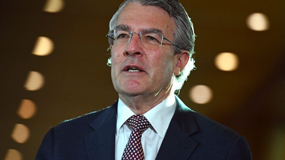 Attorney-General Mark Dreyfus speaks at a press conference at Parliament House in Canberra, Australia, Thursday, October 21, 2021. Australia's highest court has ruled, Wednesday, June 8, 2022, that a Cabinet minister illegally canceled a suspected Is