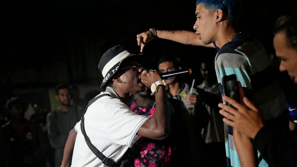 In Brazil favela, rap battle is sign of returning normality