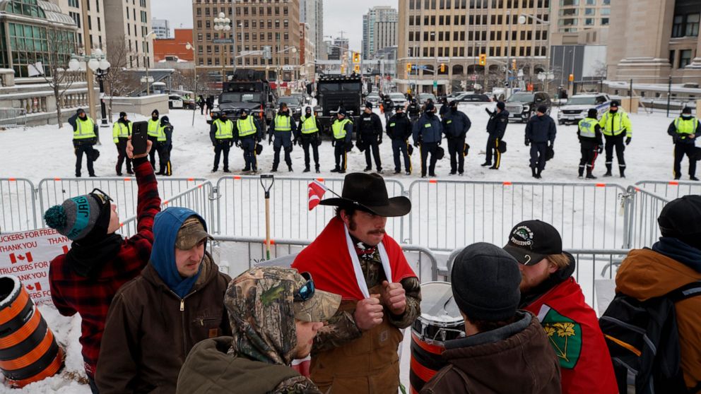 Canada police quickly push back COVID protesters
