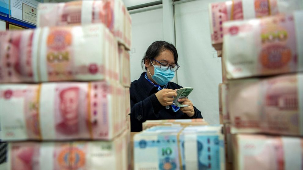 China tightens control to restrain currency's rise