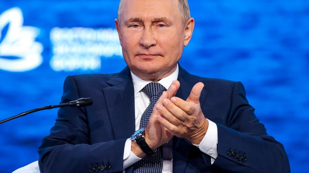 Russian President Vladimir Putin applauds during a plenary session at the Eastern Economic Forum in Vladivostok, Russia, Wednesday, Sept. 7, 2022. (Sergei Bobylev/TASS News Agency Host Pool Photo via AP)