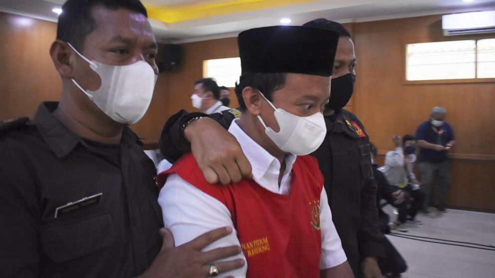 Indonesian principal given life term for raping 13 students