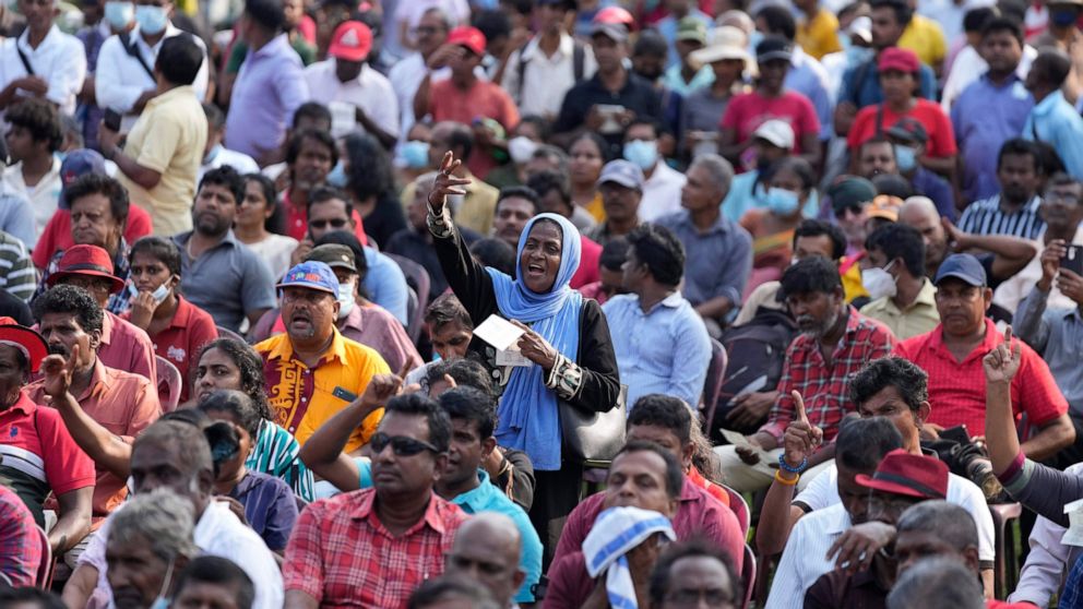 A supporter of Combined People's Movement, a collective of trade union and civil society organisations, shouts anti-government slogans during a protest rally in Colombo, Sri Lanka, Thursday, Oct. 27, 2022. (AP Photo/Eranga Jayawardena)
