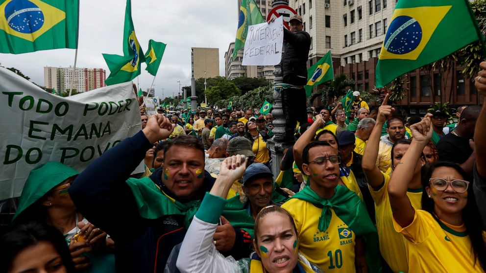 Supporters of President Jair Bolsonaro protest his defeat in the presidential runoff election, in Rio de Janeiro, Brazil, Wednesday, Nov. 2, 2022. Thousands of supporters called on the military Wednesday to keep the far-right leader in power, even as