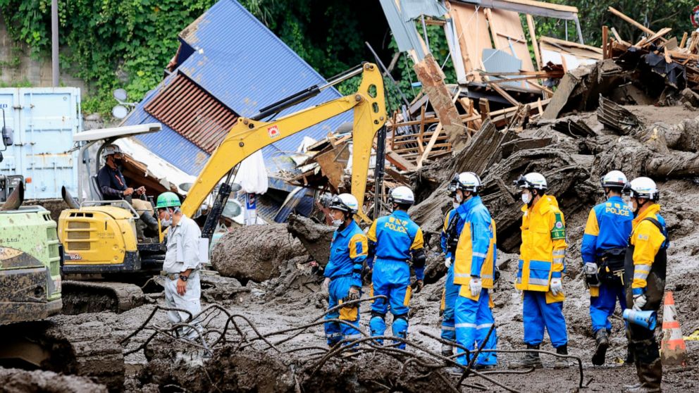 Rescuers search for missing in Japan amid fresh slide risks