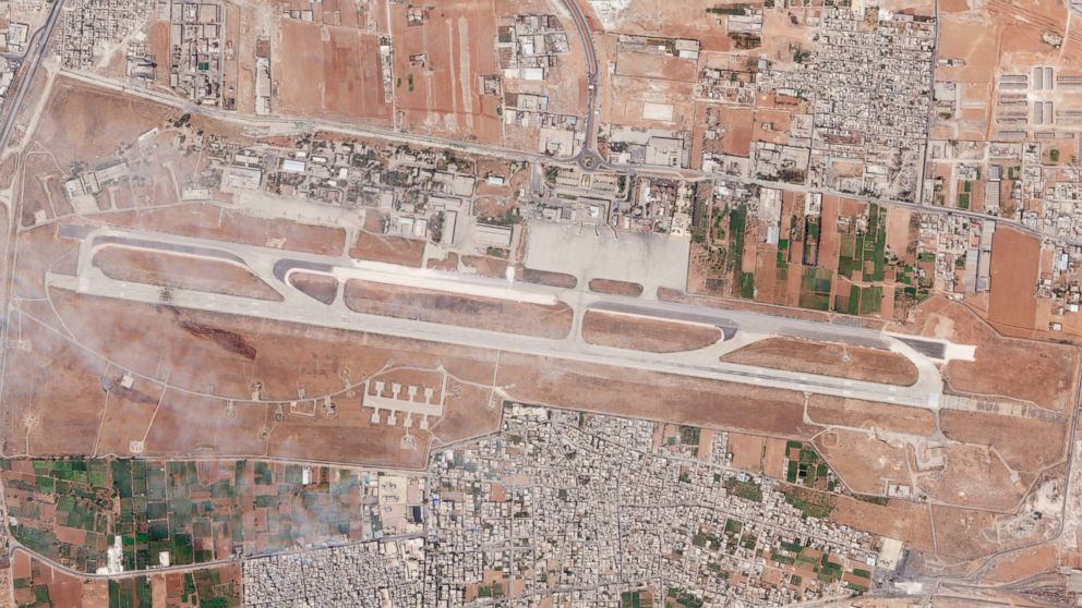 This satellite photo released by Planet Labs PBC shows the damage after an Israeli strike targeted the Aleppo International Airport, Thursday, Sept. 1, 2022. An Israeli attack targeting a Syrian airport tore a hole in the runway and also damaged a ne