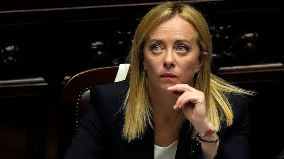 FILE - Italian Premier Giorgia Meloni listens to lawmakers speeches at the lower Chamber ahead of a confidence vote for her Cabinet, Tuesday, Oct. 25, 2022. New Italian Prime Minister Giorgia Meloni is coming to Brussels Thursday, Nov. 3, 2022, and i