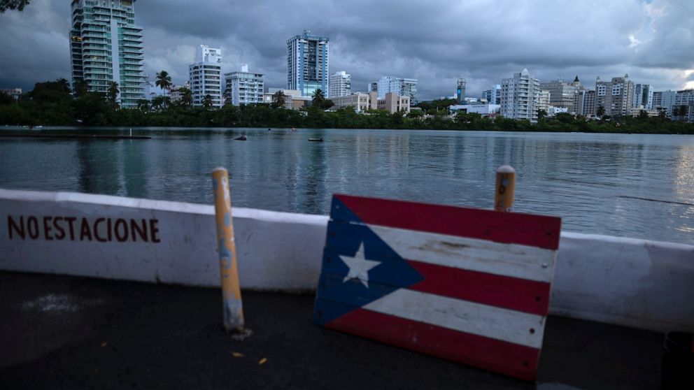 Puerto Ricans fume as outages threaten health, work, school