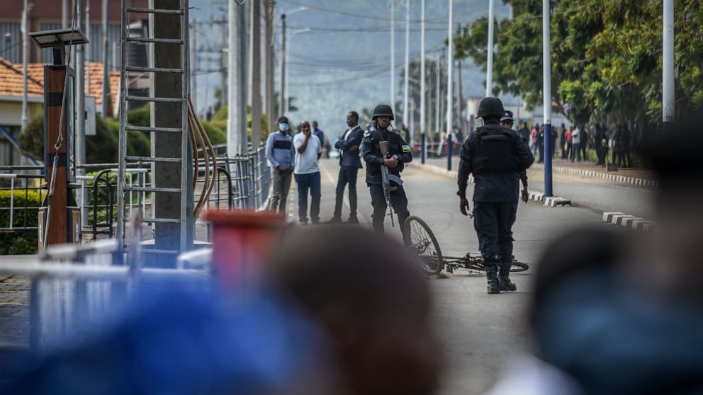 Rwandan border security forces stand guard on their side of the Petite Barriere border crossing with Rwanda in Goma, eastern Congo Friday, June 17, 2022. Rwanda's military says a Congolese soldier crossed the border and began shooting at Rwandan secu