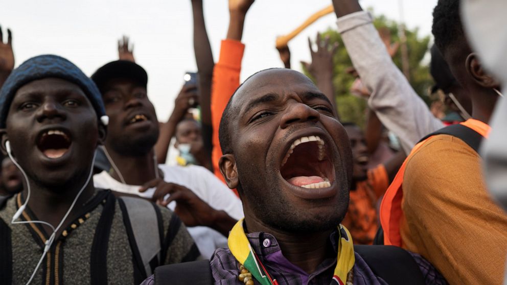 Demonstrators shout slogans during a protest demanding independence of the justice system in Dakar, Senegal, Friday, Dec. 17, 2021. (AP Photo/Leo Correa)