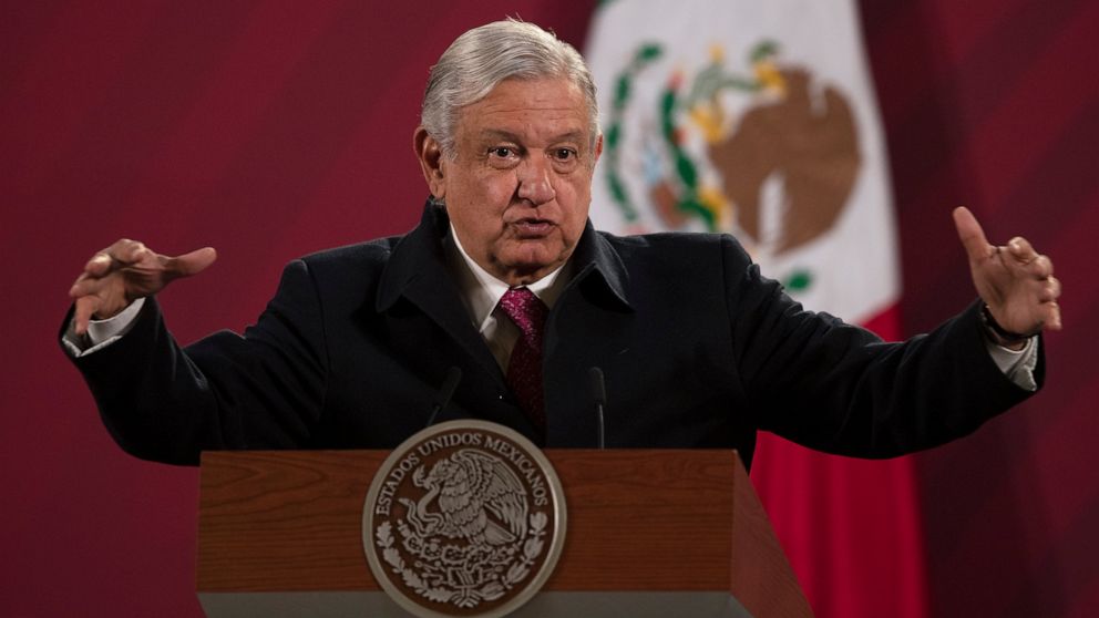FILE - In this Dec. 18, 2020 file photo, Mexican President Andres Manuel Lopez Obrador gives his daily, morning news conference at the presidential palace, Palacio Nacional, in Mexico City. Mexico President Andrés Manuel López Obrador says he has tes