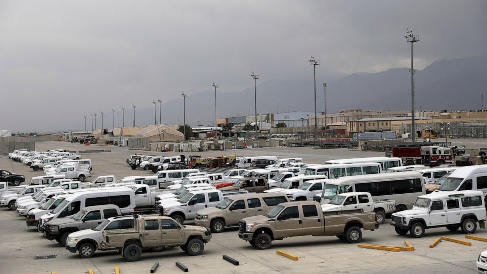 Vehicles are parked at Bagram Airfield after the American military left the base, in Parwan province north of Kabul, Afghanistan, Monday, July 5, 2021. The U.S. left Afghanistan's Bagram Airfield after nearly 20 years, winding up its "forever war," i