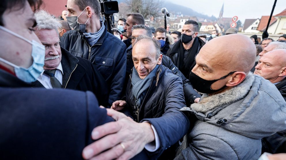 Eric Zemmour, far right candidate for the French presidential election 2022, gestures as he visits a vineyard and meets local supporters in Husseren-les-chateaux, eastern France, Saturday, Dec. 18, 2021. The first round of the 2022 French presidentia