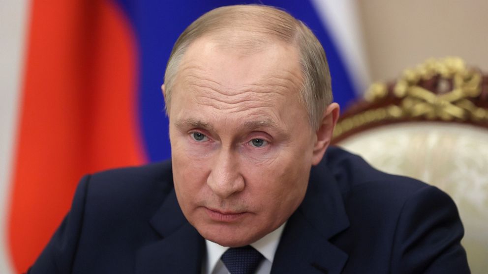 Russian President Vladimir Putin holds a video conference to address participants in a congress of the United Russia party marking the 20th anniversary of the party founding, in Moscow, Russia, Saturday, Dec. 4, 2021. (Mikhail Metzel, Sputnik, Kremli